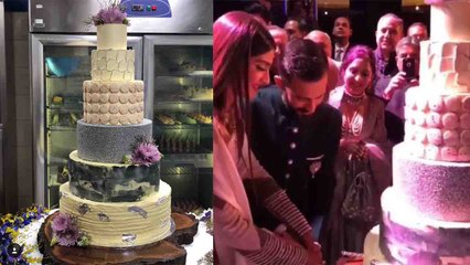 Sonam Kapoor Reception: Sonam- Anand cut the HUGE cake during Reception | FilmiBeat