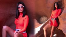 Kourtney Kardashian stands out in bright orange during romantic vacation in Arizona with Younes.