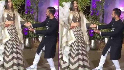 Download Video: Sonam Kapoor Reception: Anand Ahuja jumps in excitement after watching his bride Sonam | FilmiBeat