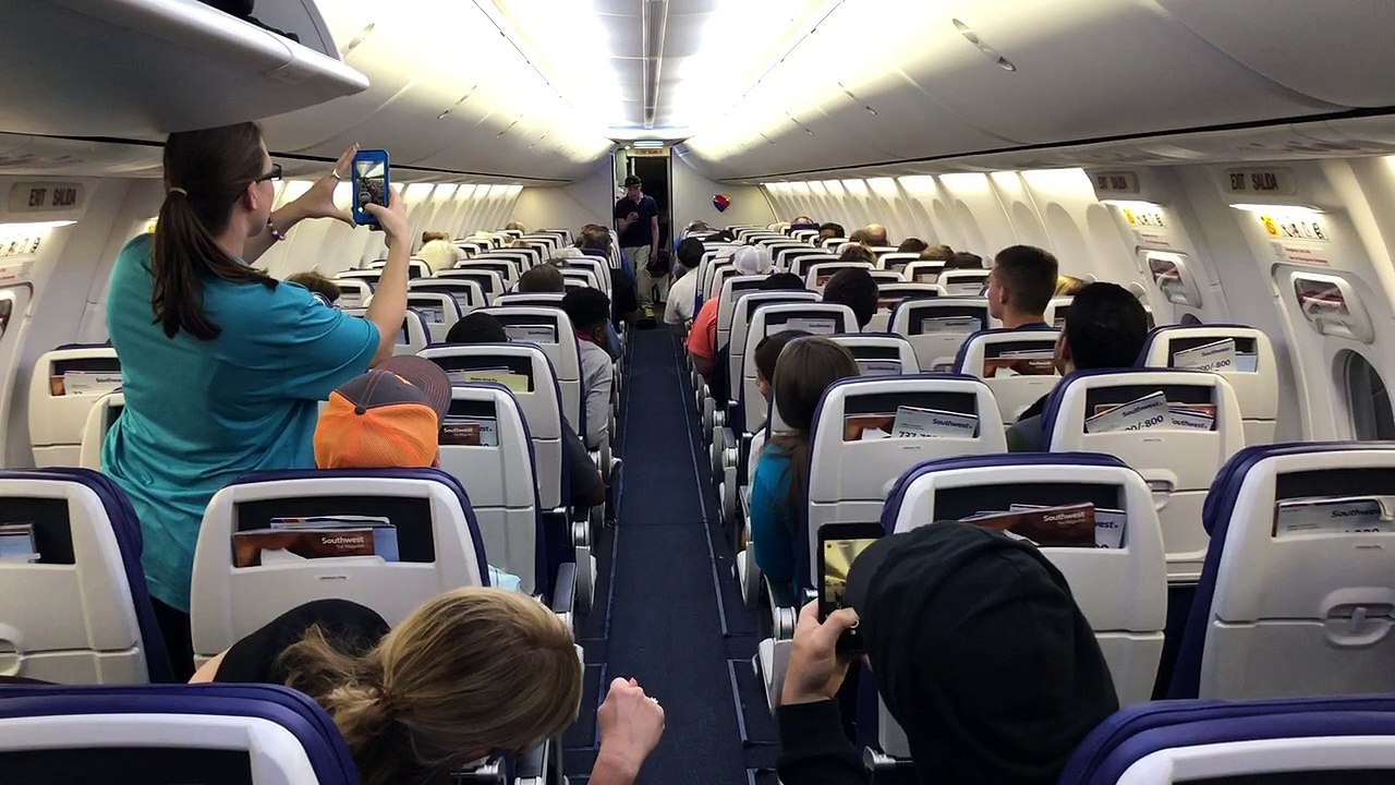 Guy Skateboards to his seat on Southwest flight!