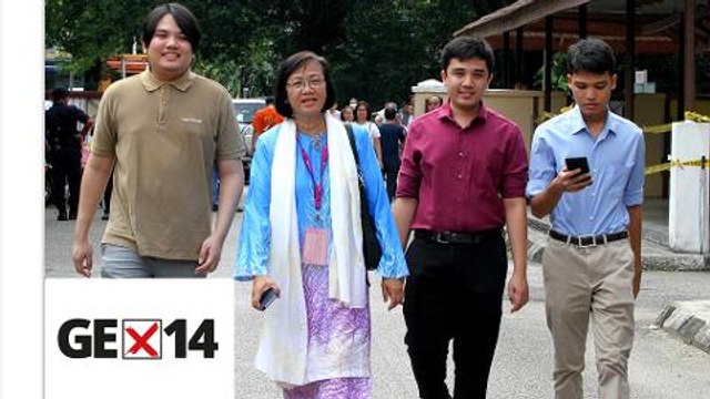 Maria Chin consoles voters who mistakenly dropped ballots in wrong boxes