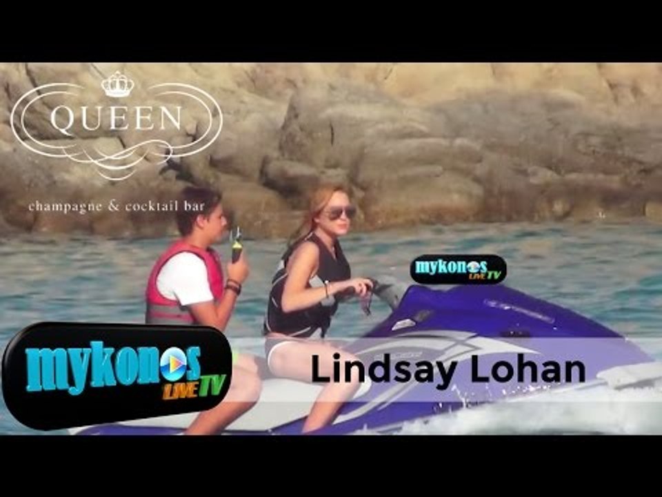 Lindsay Lohan rides the waves on a jet ski