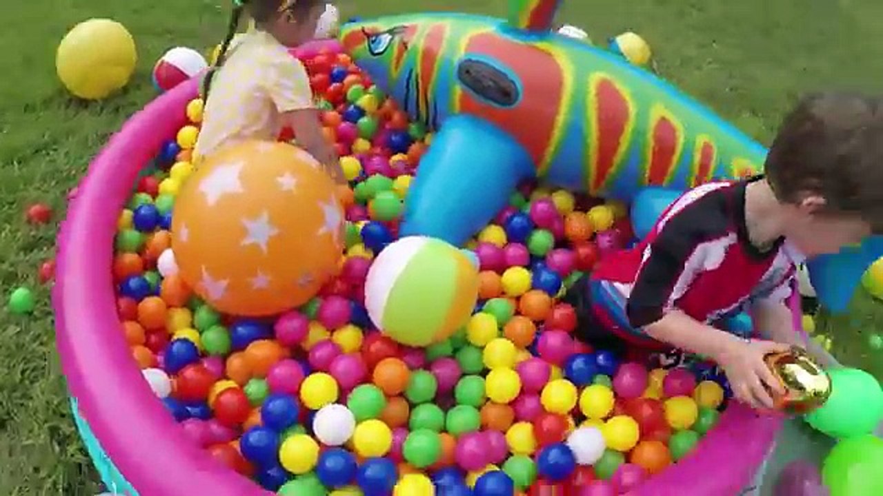 Giant Surprise Egg Hunt in a Kiddie Pool filled with Colorful Ball Pit Balls! Kids Video
