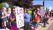 Hundreds of Counter-Protesters Stand Up to Three Members of the Westboro Baptist Church