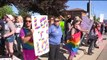 Hundreds of Counter-Protesters Stand Up to Three Members of the Westboro Baptist Church