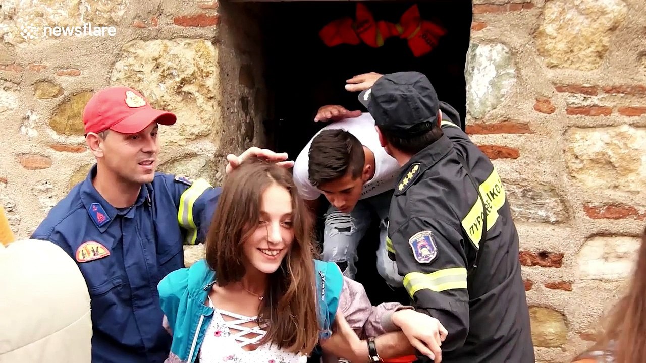 Firefighters rescue students trapped in White Tower as floods hit Greece