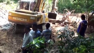 excavator EX200 stuck in mud