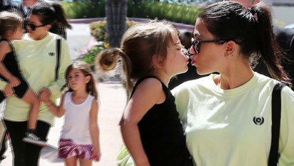 Kourtney Kardashian takes kids out to art class before getting a kiss from youngest son Reign Disick.