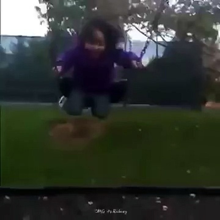 Black girl falls off swing vine