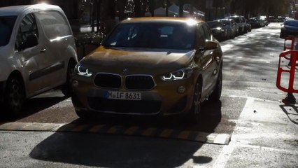 The new BMW X2 xDrive 20d Driving in the city