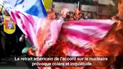 Des Iraniens brûlent un portrait de Trump et un drapeau des USA