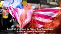 Des Iraniens brûlent un portrait de Trump et un drapeau des USA