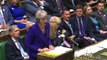 May and Corbyn clash over buses at PMQs