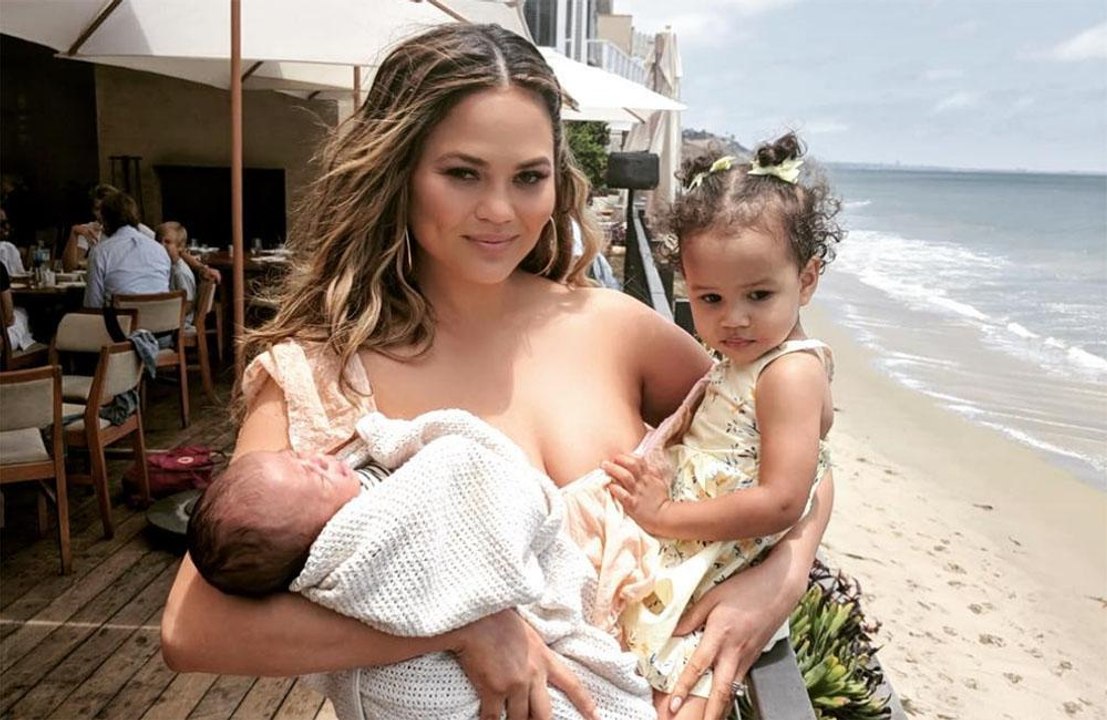 Chrissy Teigen slams critics by posting family photo