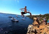 Outdoor Enthusiasts Jump Cliffs in Western Australia