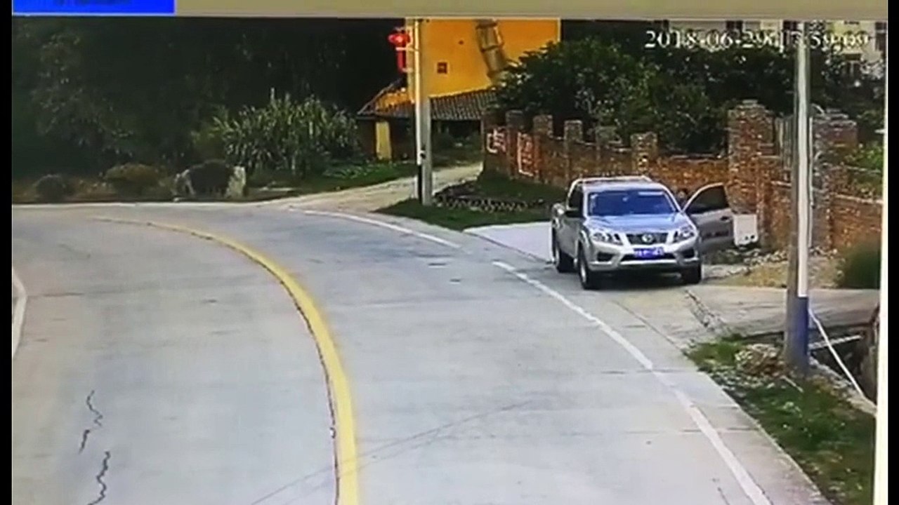 Tyre falls from lorry and lands on roof of parked car with driver inside