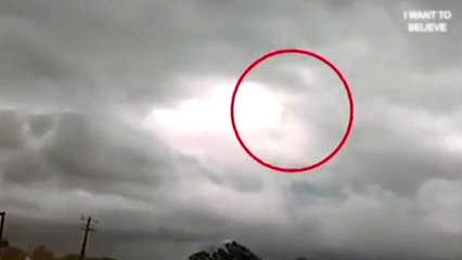 Walking humanoid silhouette in the sky over Alabama