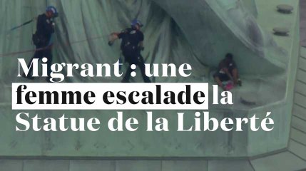 Une femme escalade la Statue de la Liberté contre la politique migratoire de Trump