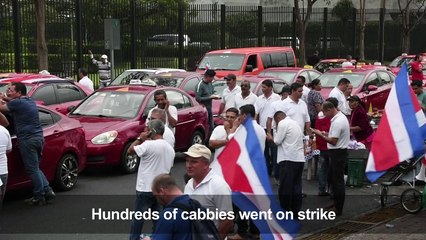 Taxi drivers in Costa Rica protest against Uber