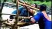 World's most dangerous school run! Kids cross flooded river in a bamboo basket