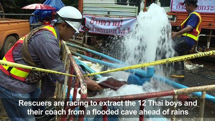 Rescuers race as rain threatens Thai boys in the cave