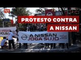 Funcionários da Nissan dos EUA protestam durante passagem da tocha