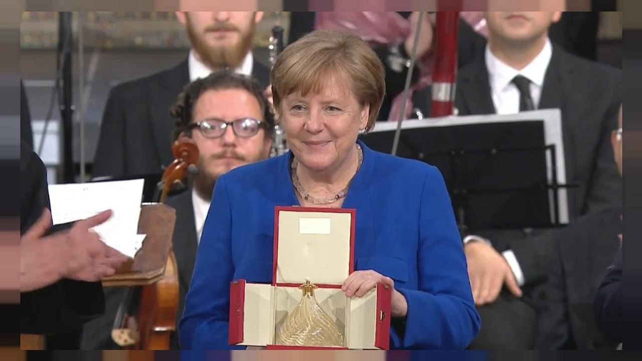 The German Chancellor, Angela Merkel received the 'Lamp of Peace' in Assisi in Italy.