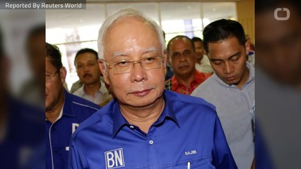 Malaysian Police Raid Apartment Connected To Ousted PM Najib's Family