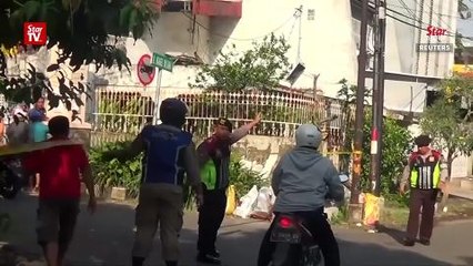 More than a dozen killed in Indonesia church bombings