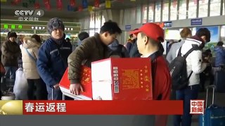 [中国新闻]春运返程：受降雪影响 铁路客流激增