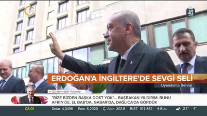 Erdoğan, İngiltere'de büyük sevgi gösterisiyle karşılandı