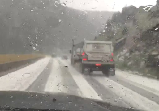 Heavy Hail Covers Colorado Highway