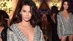 Kendall Jenner flashes her long legs in plunging silver sweater during glam party in Cannes