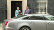 Theresa May departs Downing Street ahead of PMQs