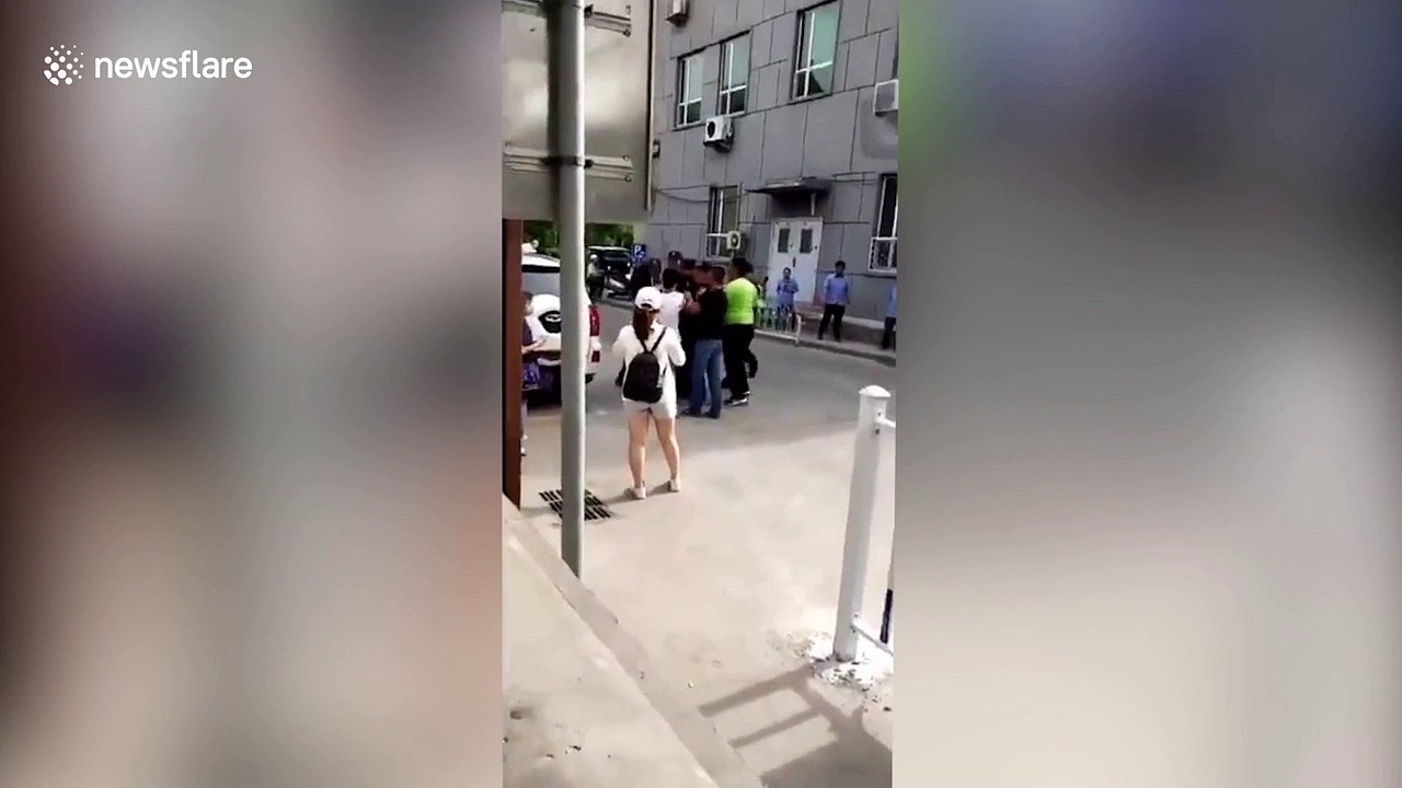 Women 'beaten for wearing rainbow badges' at Beijing arts event