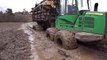 John Deere 1110E with big load in wet conditions
