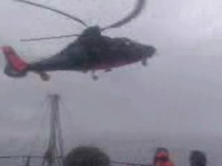 Vol stationnaire avec descente de la civiere