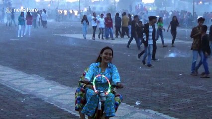 Indonesian teenagers mark start of Ramadan with firecracker battle