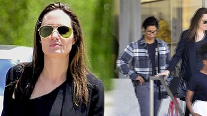 Angelina Jolie, 42, is slender is black as she takes only TWO of her six kids shopping on Mother's Day