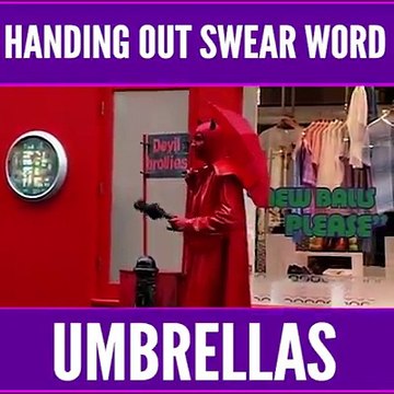 Handing out swear word Umbrellas