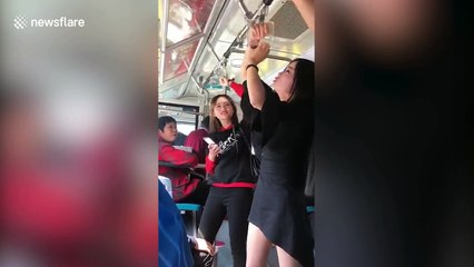 Woman gets hand stuck in handrail on bus