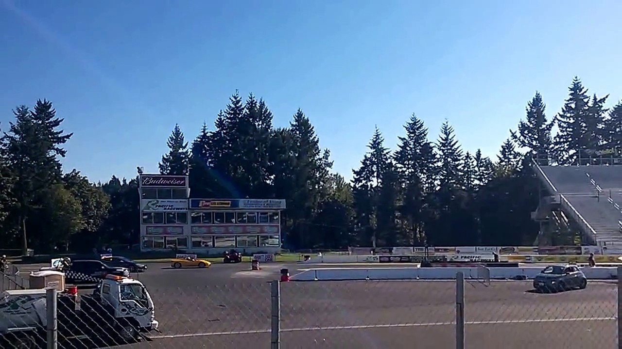 Tesla Roadster vs. Tesla Model S - drag race at Pacific Raceways
