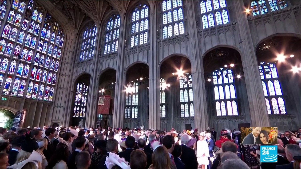 Bride Meghan Markle walks down the aisle