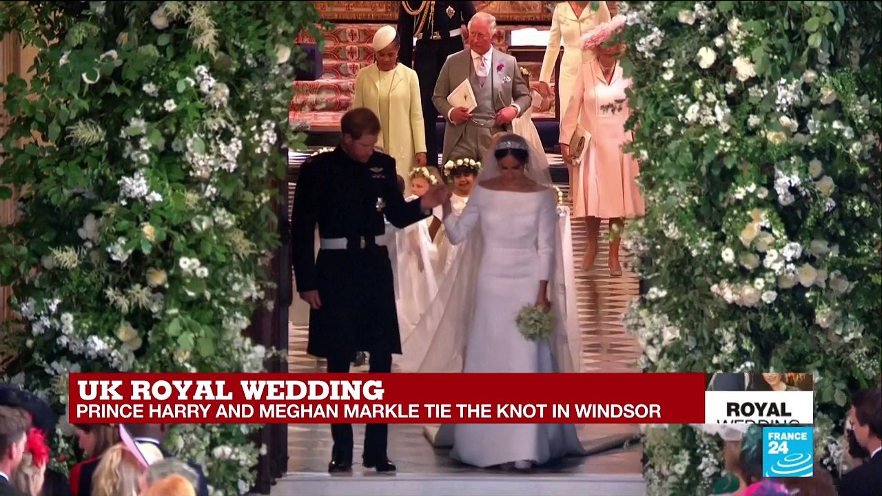 Prince Harry and Meghan Markle exit St. George''s Chapel