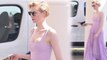 Elizabeth Debicki looks regal in a plunging lilac gown as she heads out during Cannes Film Festival