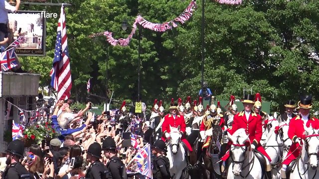 Crowds greet newlyweds Prince Harry and Meghan Markle after their marriage ceremony