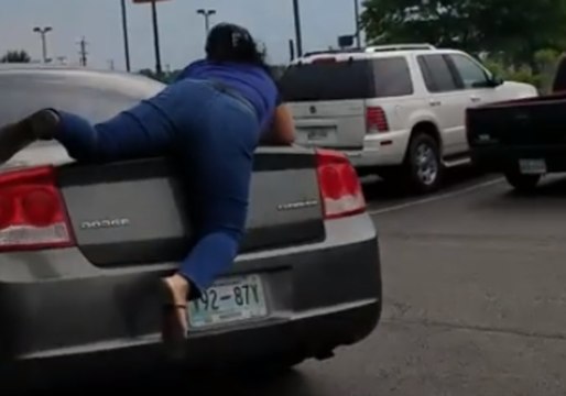 Public Argument Leads to Woman Riding on Top of Fleeing Car