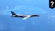 China lands bomber on man-made islands for first time