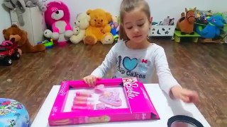 Barbie makeup set tutorial for children . Kit for girls. Cute video