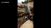 Teen survives terrifying slip down 30ft waterfall